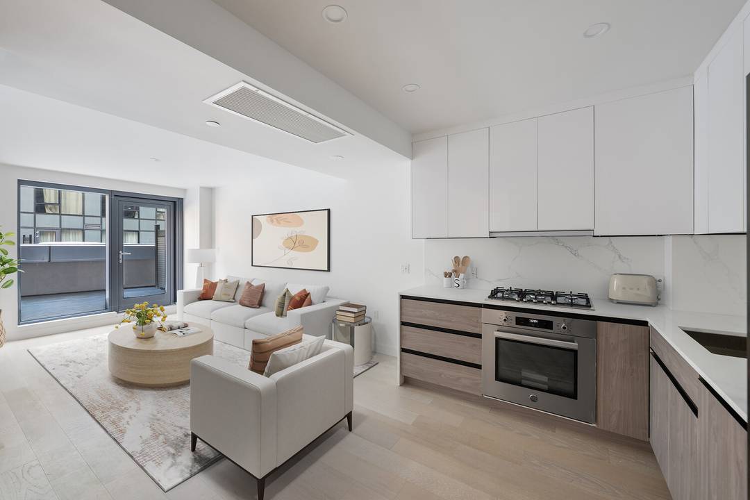 This two bedroom, two bath residence features a well designed layout and a generous private terrace that expands your living space.