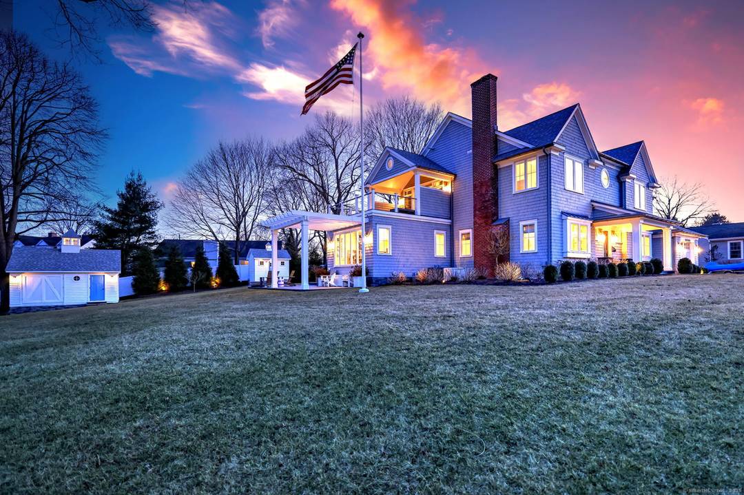 Stunning New England Colonial with Breathtaking Gulf Pond Views.