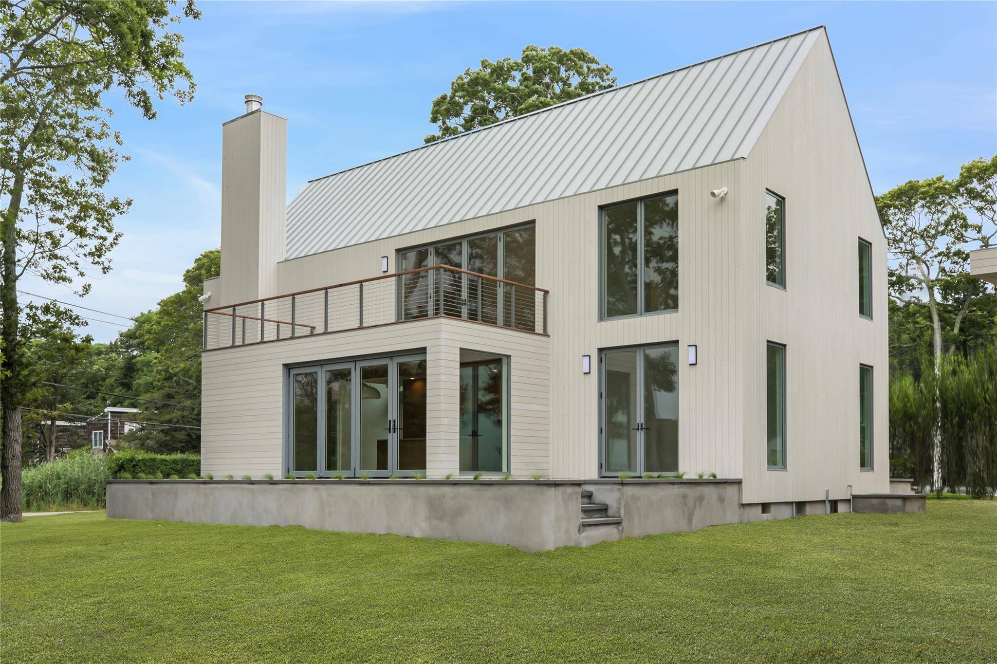 NEW WATERFRONT CONSTRUCTION Thoughtfully crafted and beautifully finished, this 4 bedroom, 5 bath custom waterfront home offers over 2, 900 sq ft of elevated living space a seamless blend of ...