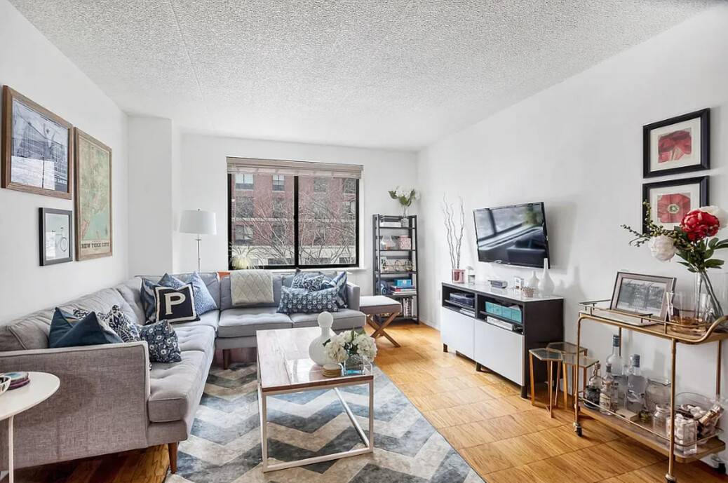 A wonderful place to call home, this spacious one bedroom apartment has a pass through kitchen, large living room, king sized bedroom, marble bathroom, and three closets throughout.