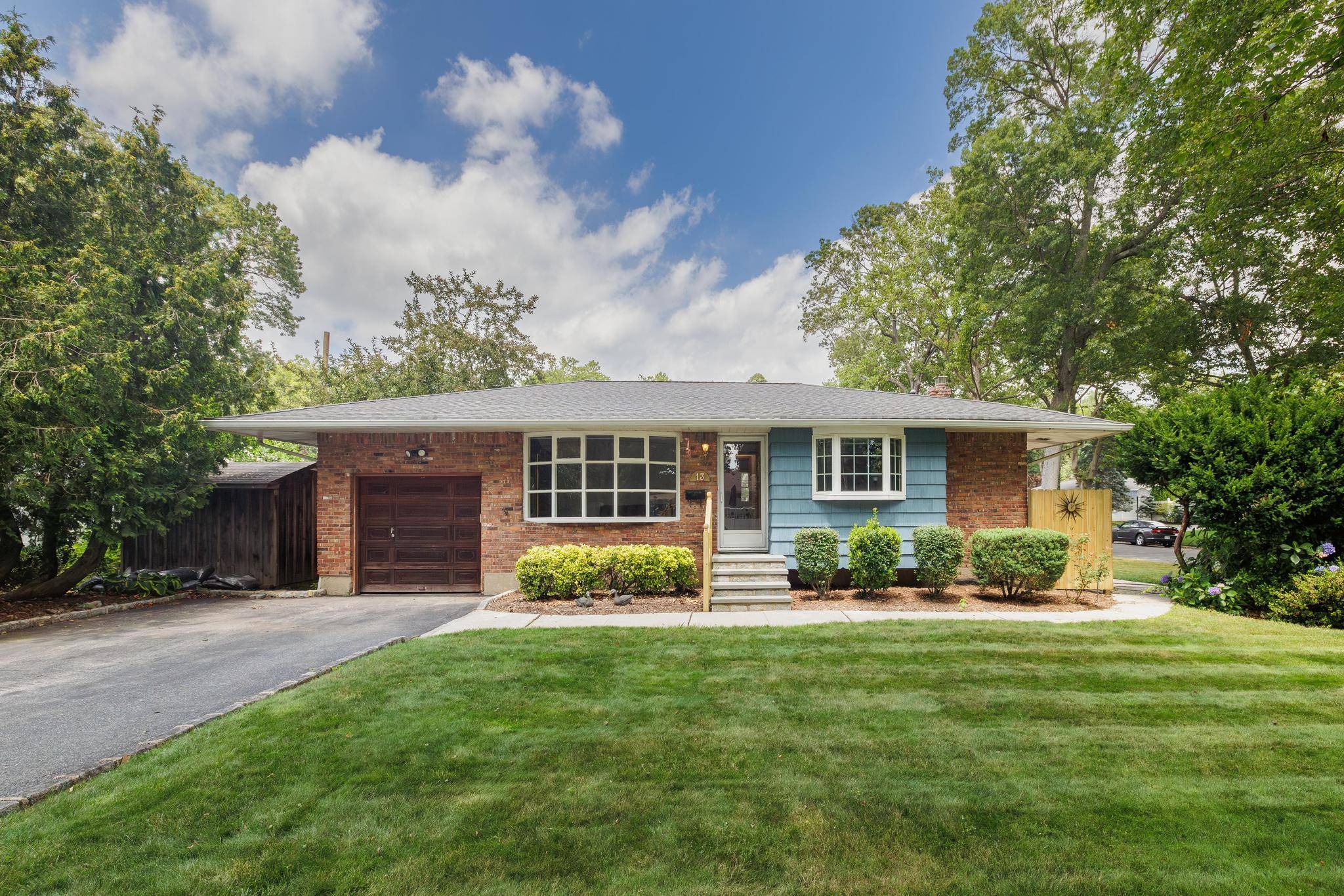 Welcome Home to this beautifully maintained 3 bedroom, 1 bathroom ranch nestled on a spacious ¼ acre corner lot in the heart of South Huntington.