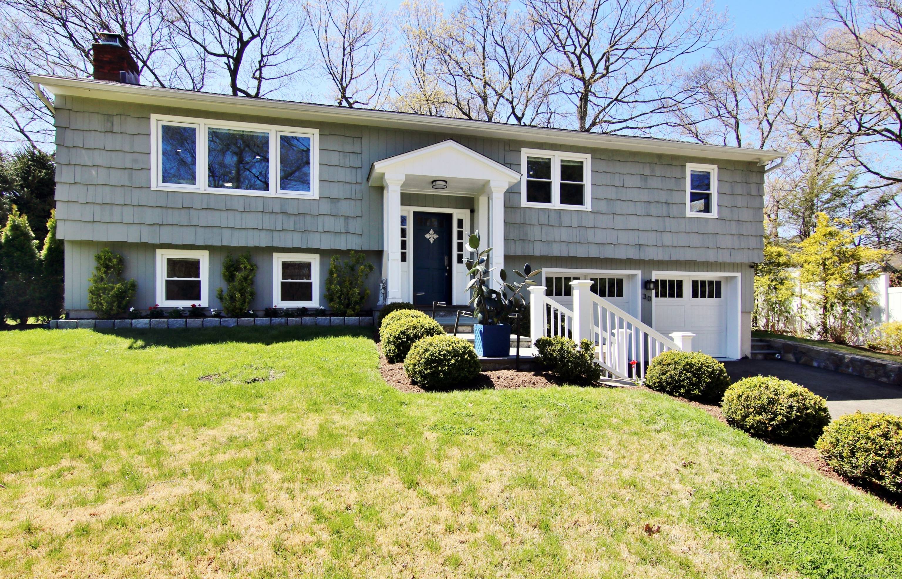 Bright updated home in Rowayton convenient to shopping and train.