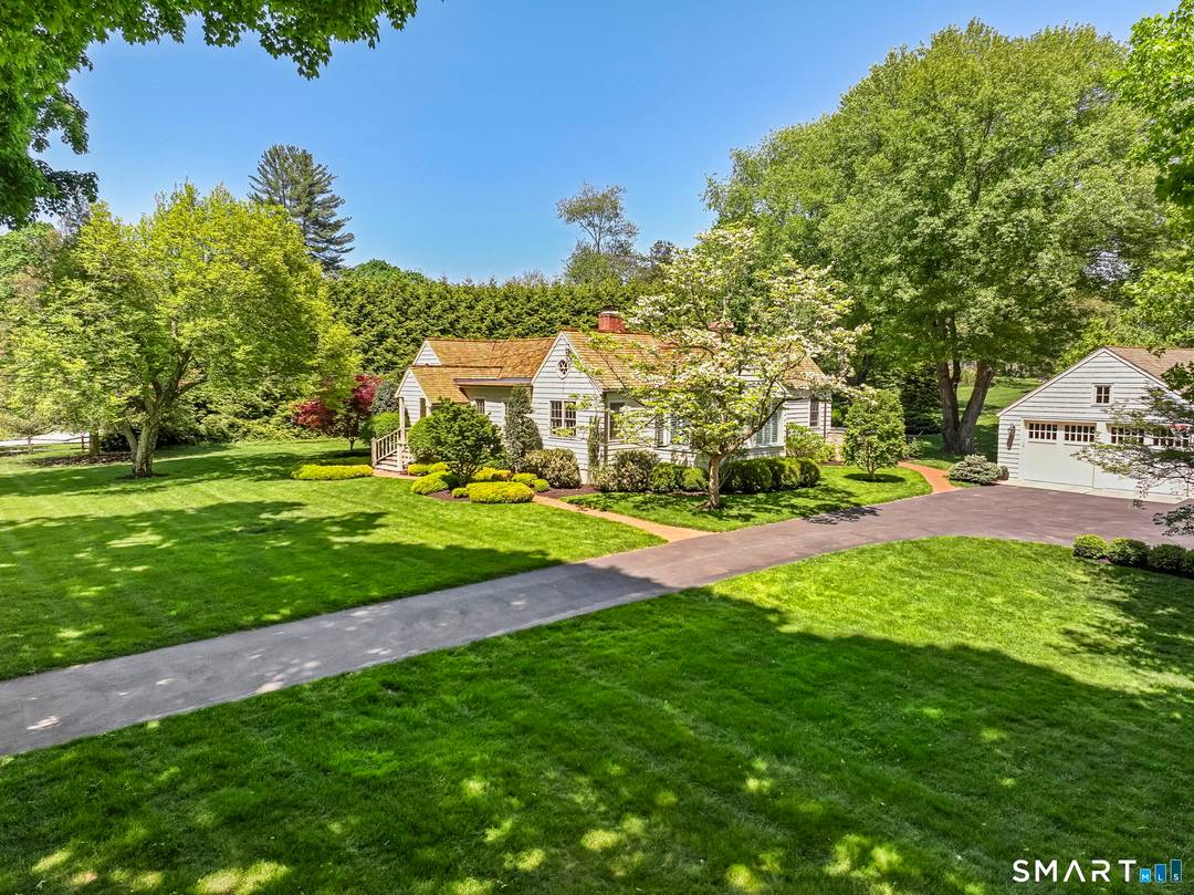 Comfort, style, and luxurious one level living converge in this beautifully redesigned home, ideally located in lower Greenfield Hill.