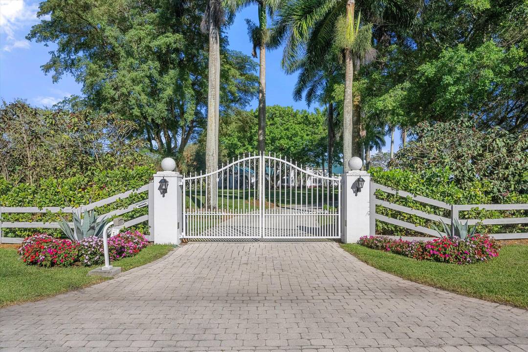 An opportunity to own a stunning lakefront equestrian estate on 3.