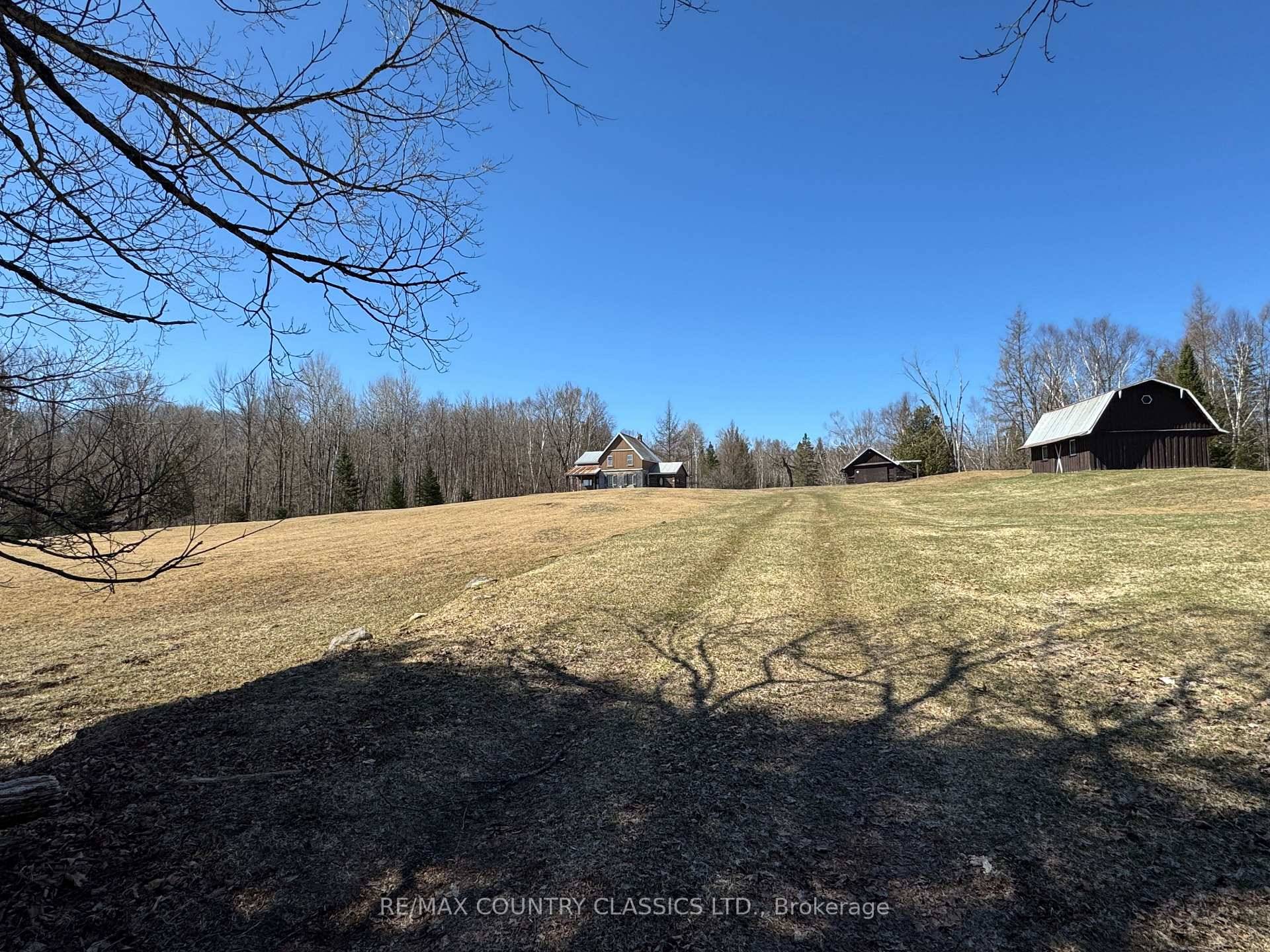 Set well back from the road, between two lovely meadows, sits this peaceful, comfortable century home.