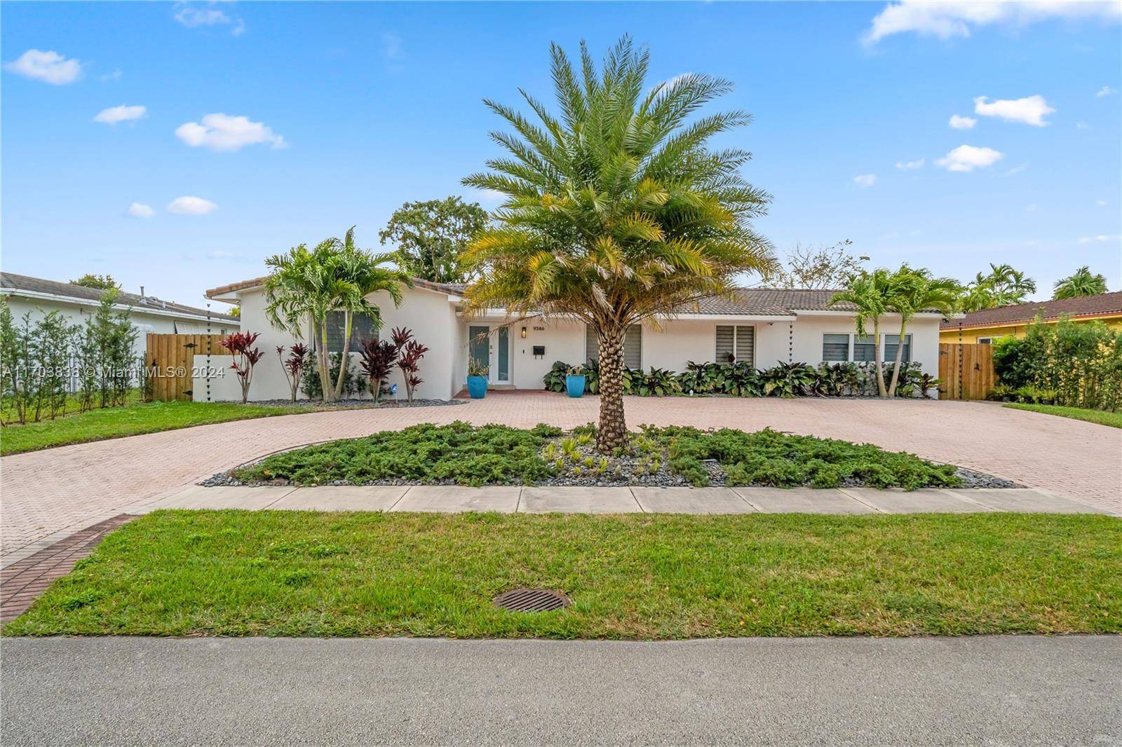 Spacious East Kendall Single Family Home with 5 Bedrooms 2 bathrooms and almost 4, 000 sq ft of living space, featuring a circular pavered driveway, Impact Resistant Windows and Doors, ...