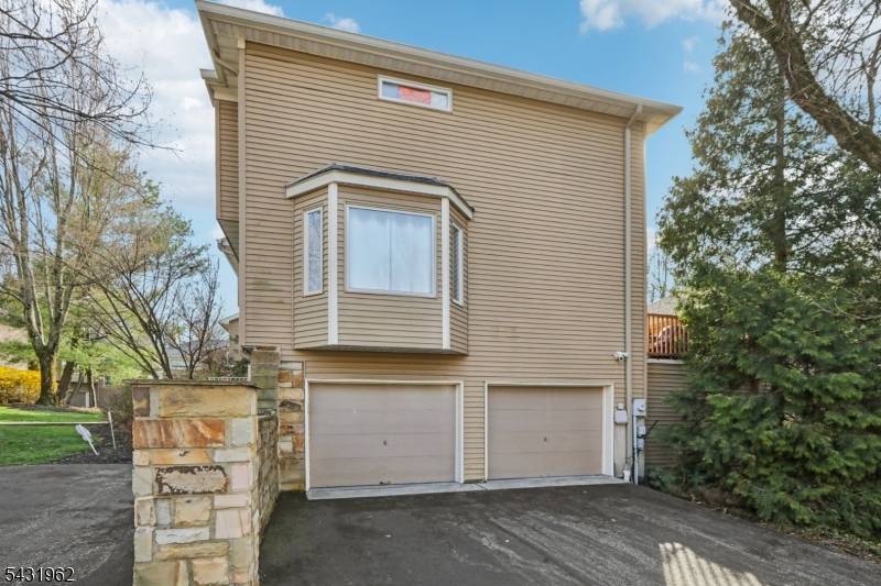 Welcome to 210 Clarken Dr, a fully renovated luxury townhouse in West Orange ?