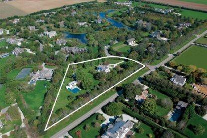 Location Location ! Situated on almost 3 acres this property features a stately 1930 home originally moved from Georgica.