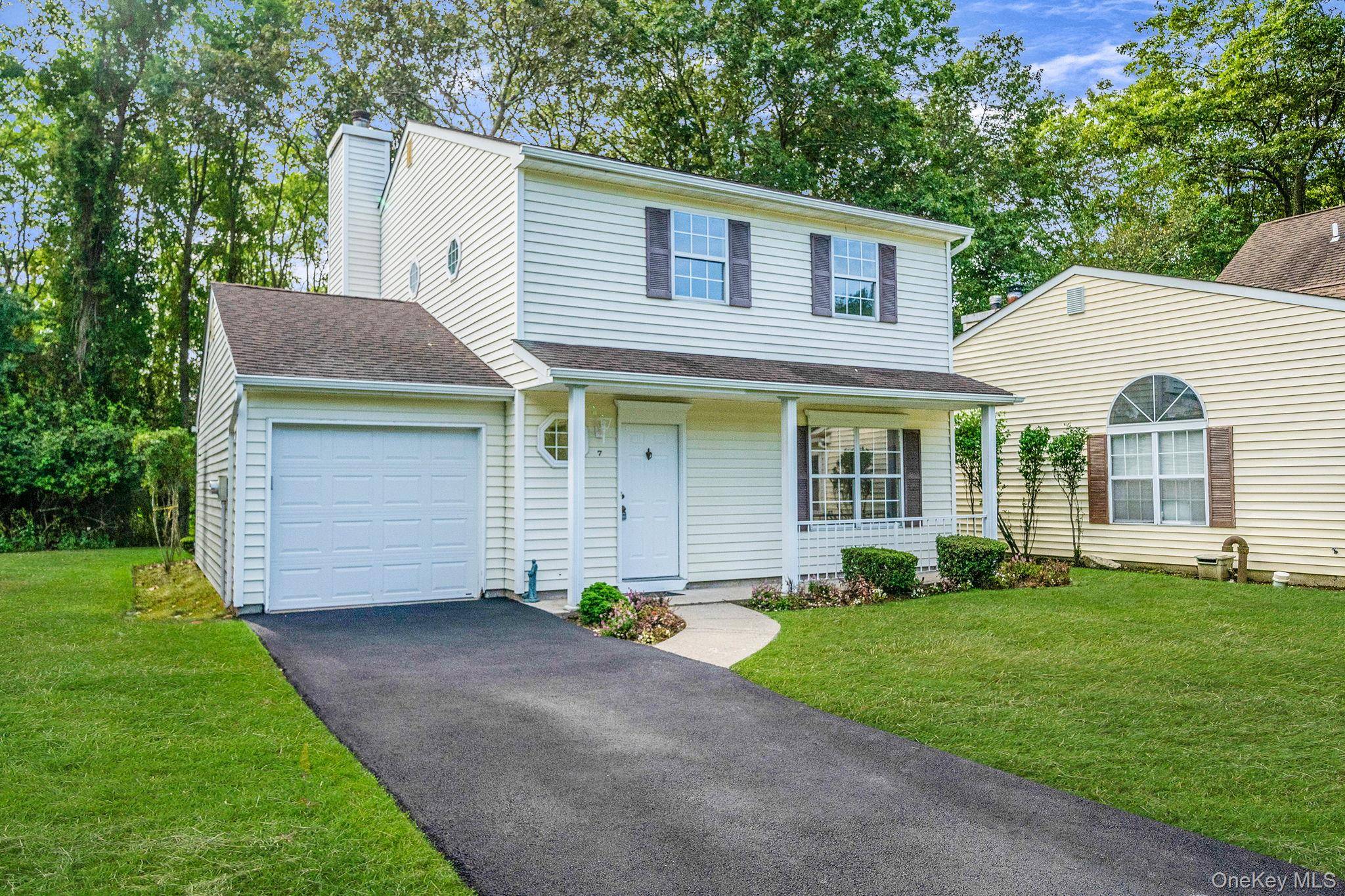 Welcome to 7 Mallard Path in the highly sought after Hunt Club at Coram a private, resort style community offering the perfect blend of comfort, convenience, and amenities.