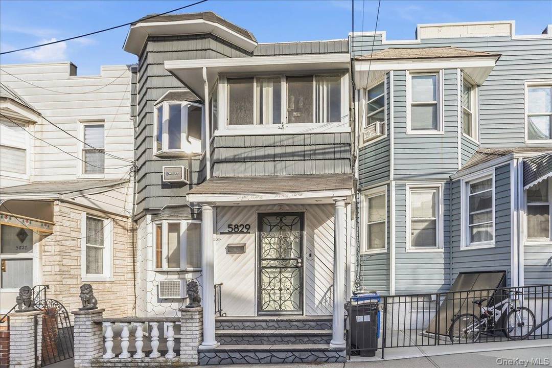 Welcome to this beautifully maintained attached two family residence in the highly desirable Maspeth section of Queens, offering a convenient location with access to both Manhattan and Brooklyn.