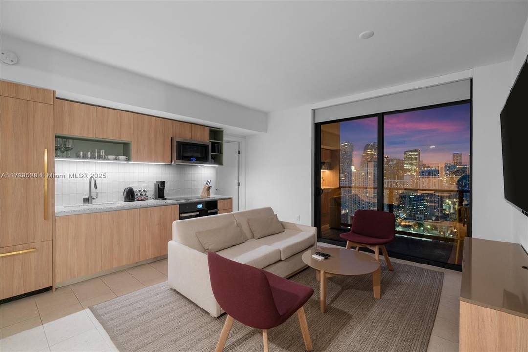 Welcome to Unit 3105 at The Gale Miami Hotel amp ; Residences a stunning 2 bedroom, 2 bathroom residence offering panoramic views of Biscayne Bay and breathtaking skyline sunsets.