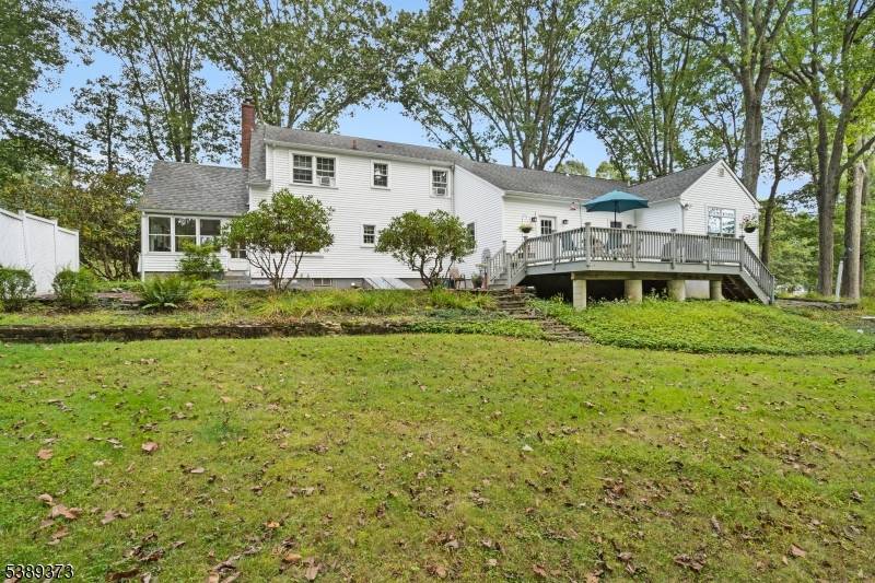 Welcome to this beautifully expanded Cape Cod home, perfectly blending classic charm with modern convenience.