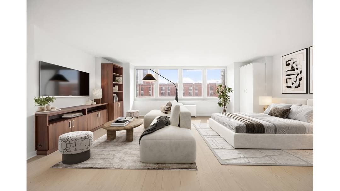 Welcome to Residence 907 at One Rector Park a high floor, south facing studio with Hudson River views, offering bright, refined living in the heart of Battery Park City.