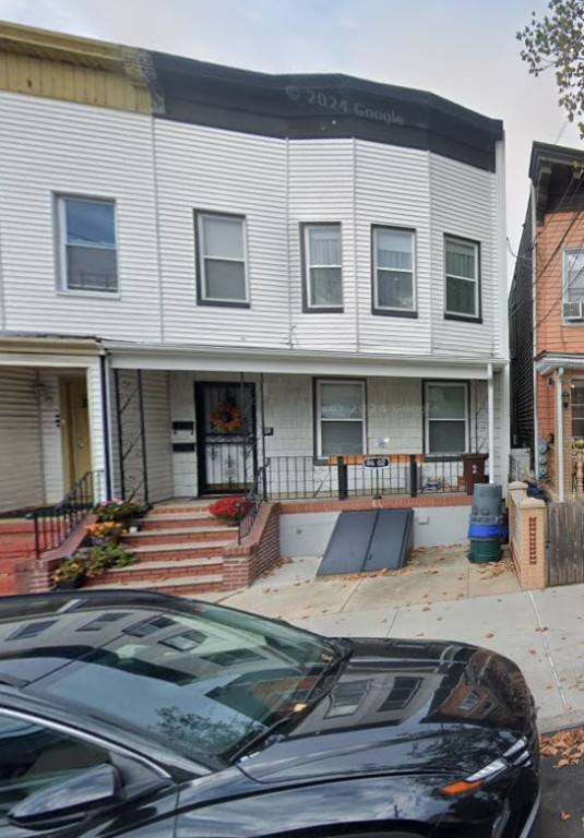 Two family home in Woodhaven, ideally located in close proximity to the J and Z subway lines.