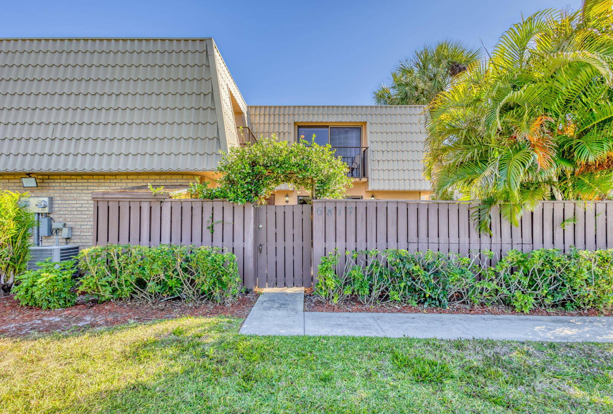 Wake up to serene water views every day in this beautiful townhouse nestled in the heart of West Palm Beach.