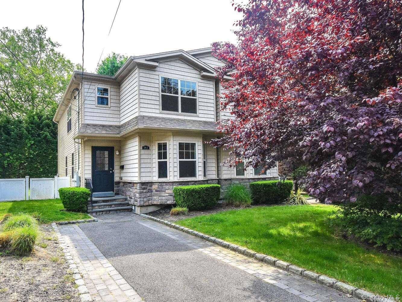 This spacious Duplex in the Village of Manorhaven features 3 bedrooms, 2.