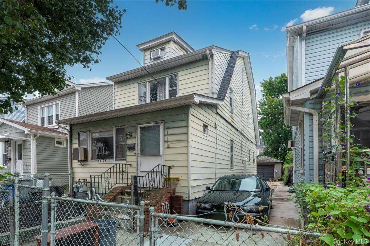 This is a two family colonial in Flushing, Queens, offering three bedrooms and two full bathrooms.