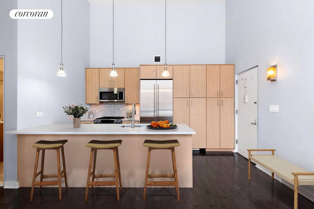 Residence 1H at The Foundry Condominium 2 40 51st Avenue is a standout two bedroom, two bathroom home with dramatic 16'6 ceilings that create an immediate sense of scale, light, ...