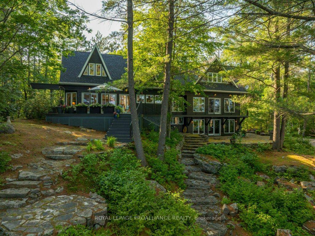 Welcome to Skootamatta Lake and this architecturally designed home that optimizes the balance of amenities and features with the natural Canadian shield waterfront topography.