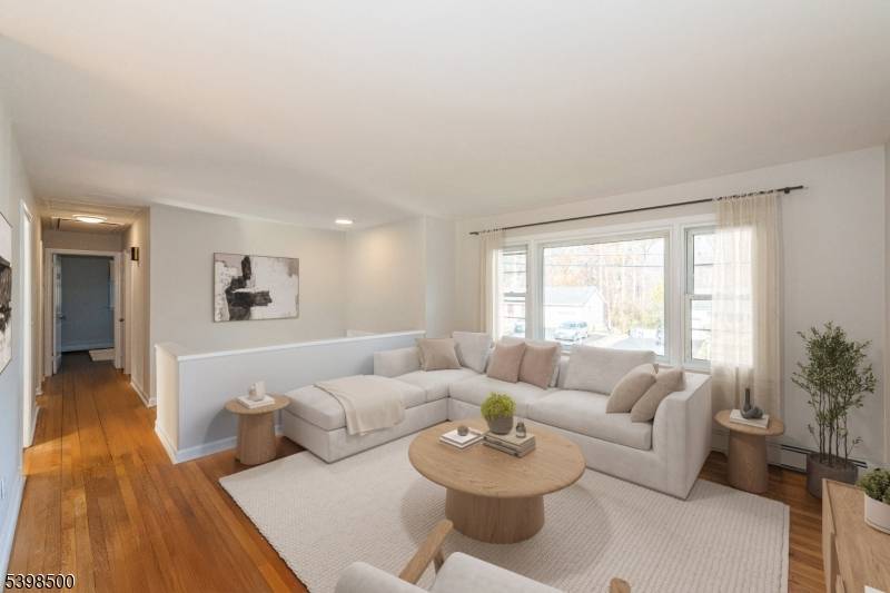 Wonderful 3 bedroom home on a quiet dead end street in Cedar Knolls, with updated Kitchen, stainless steel appliances, spacious rooms, hardwood floors, in ceiling surround sound speakers, expansive deck, ...