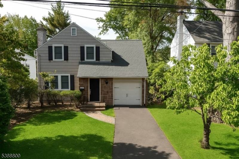 LOVINGLY MAINTAINED COLONIAL HOME IN DESIRED LOCATION.