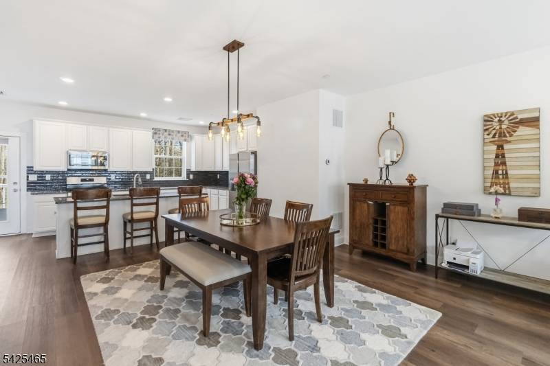 Ideally situated within The Hills complex, this recently built townhome offers three floors of easy living.