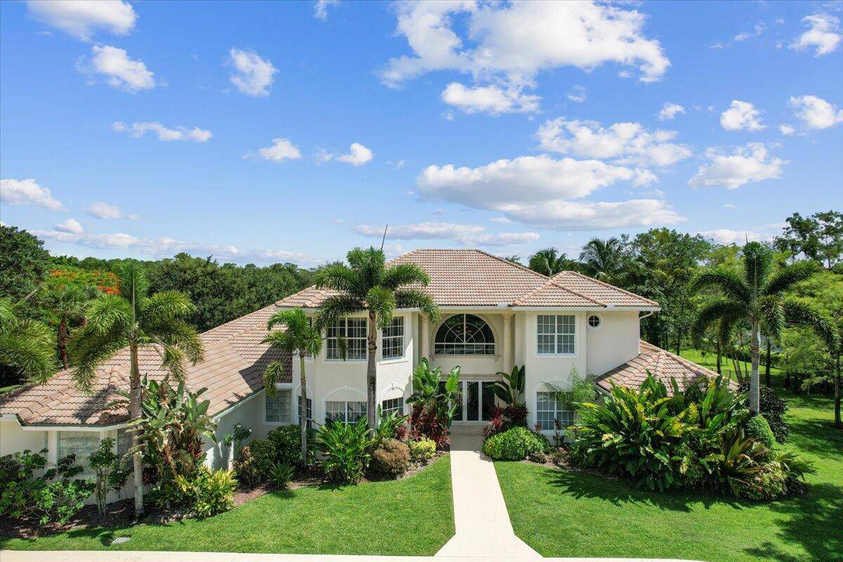 Stunning estate on 2 acres with room to build equestrian facilities.