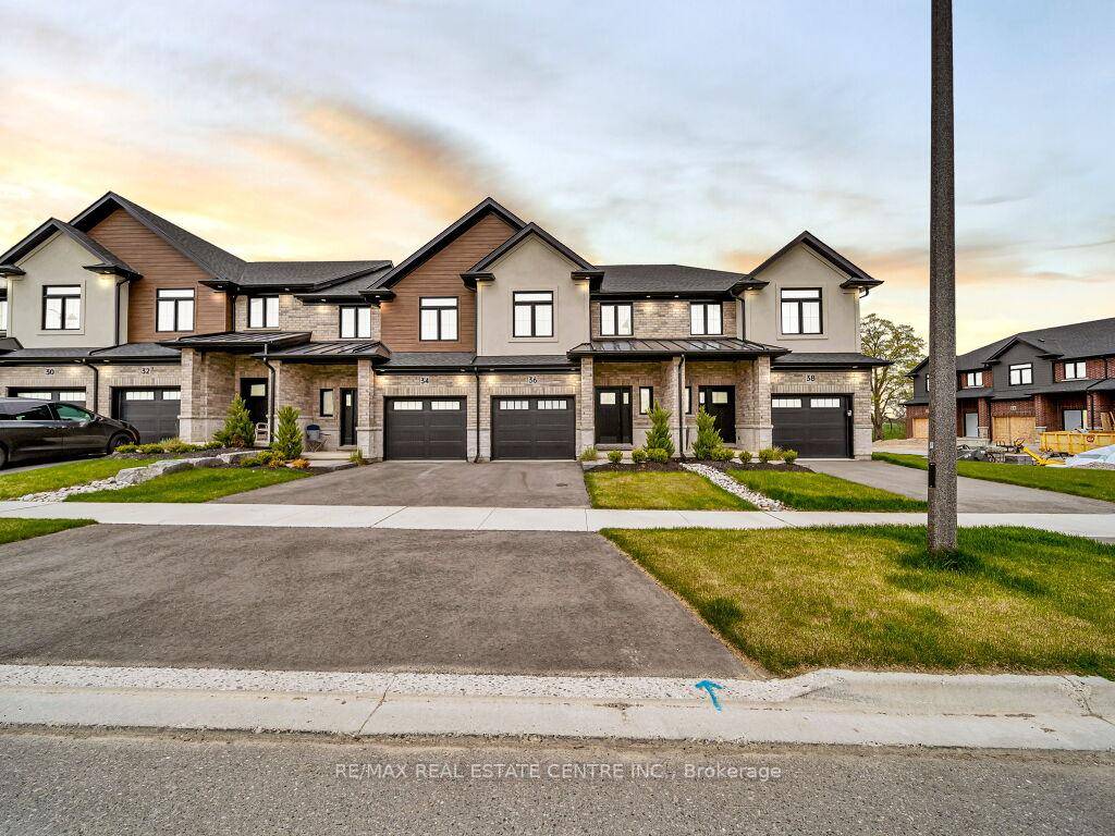 Less than a Year New Feels Like Brand NEW featuring an open concept main floor with 9' ceilings amp ; engineered hardwood along with luxury features throughout including quartz countertops ...