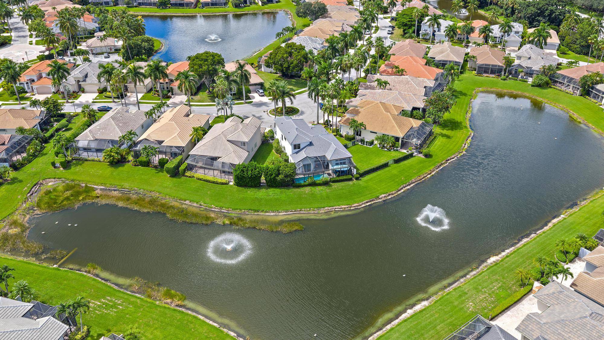 This rare and elegant Hamilton II former builder's model is ideally situated on a premium cul de sac lot with sweeping water views and it's move in ready with a ...