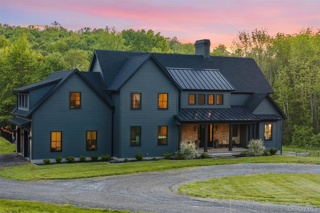 Luxury meets sustainability in this one of a kind custom estate home nestled on 9 serene, wooded acres.