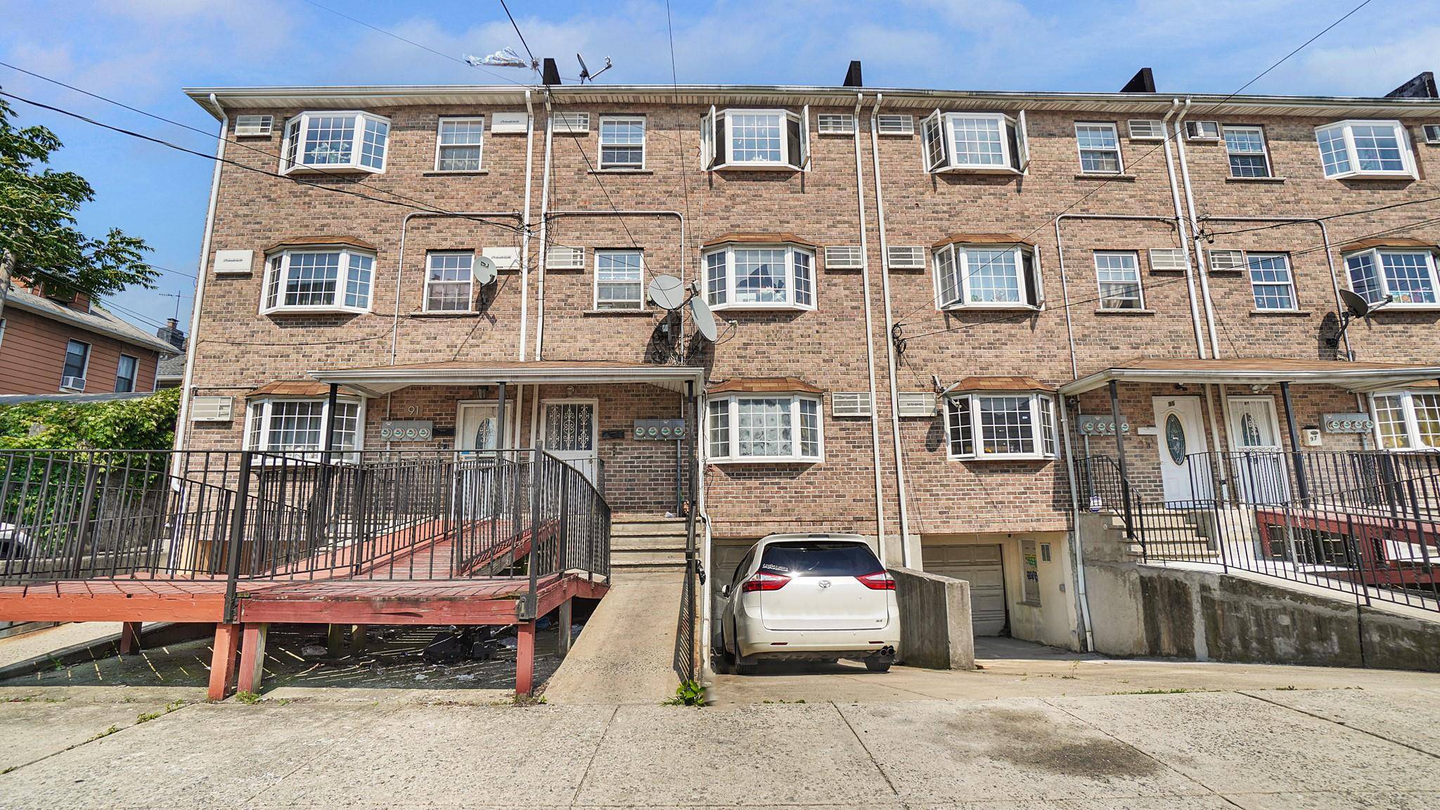 Spacious Brick 3 Family with Renovated Basement, Garage amp ; Driveway Rare Find in East Flatbush Welcome to 93 E 57th St, a beautifully maintained brick 3 family home in ...