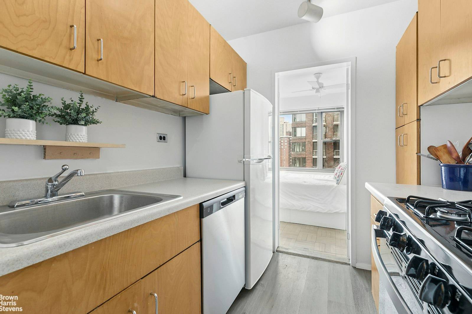This sunny and cozy alcove studio on a high floor faces west with open City views and great light.