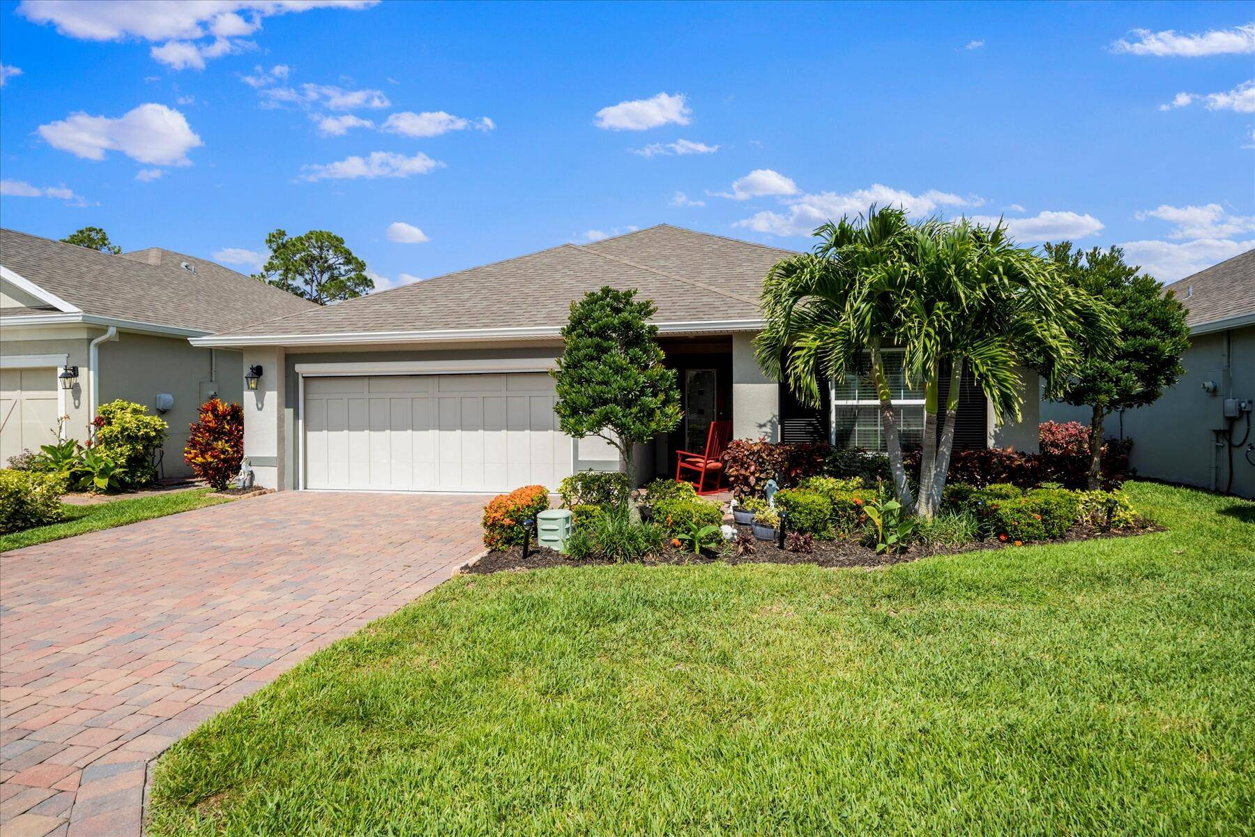 Beautifully designed and meticulously maintained 2019 split plan 3 2 home in sought after Sandcrest gated community.
