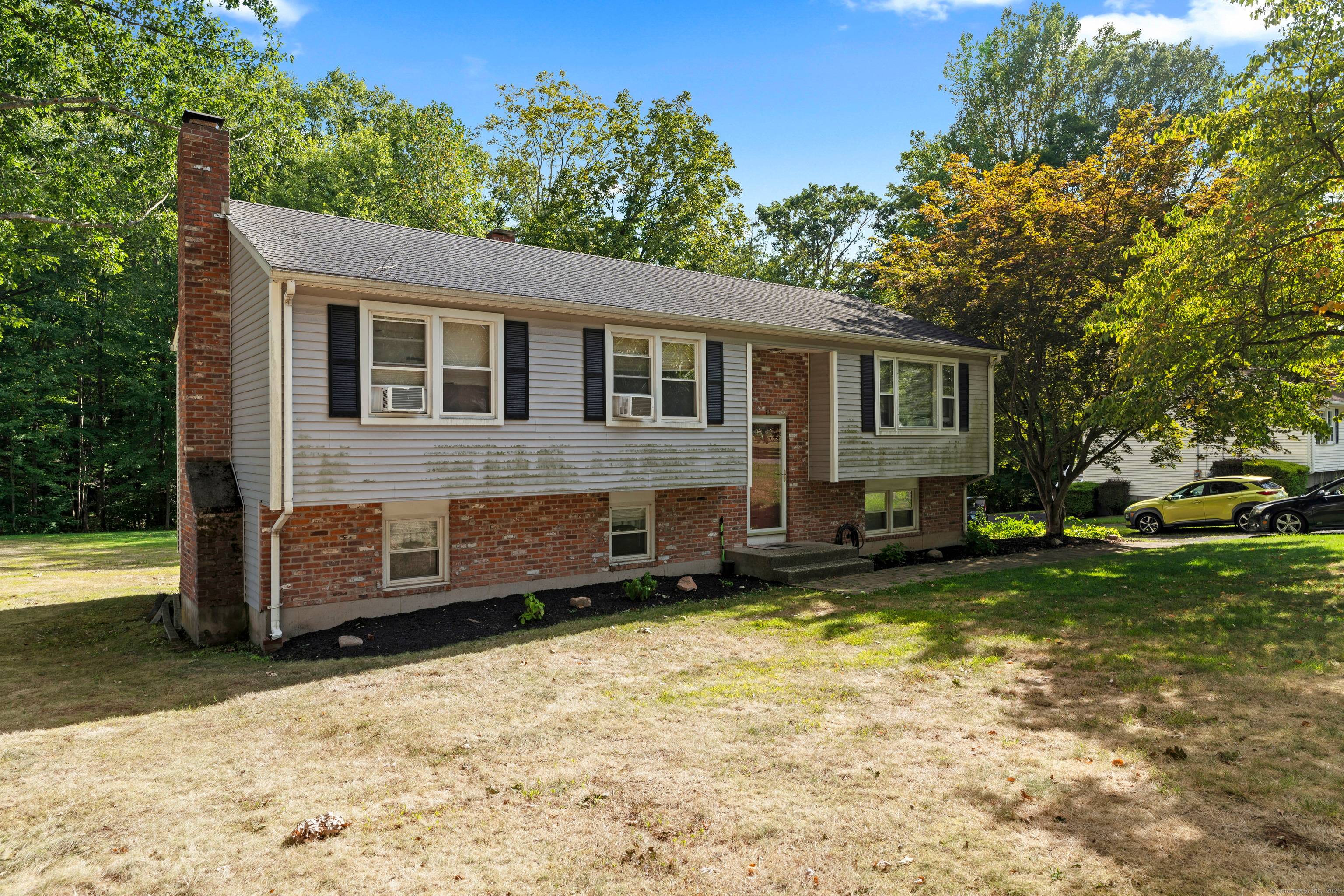 Nestled in a great location, this charming Raised Ranch offers the perfect blend of comfort, style, and versatility.