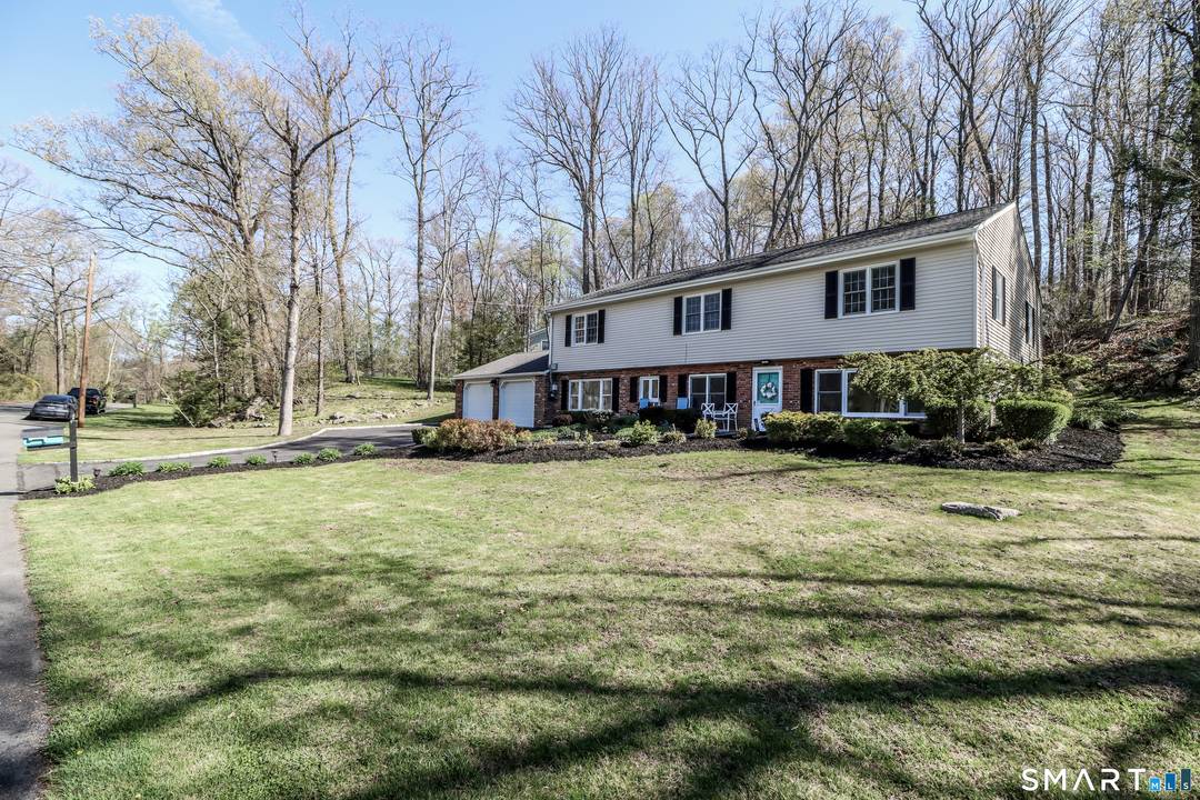 Located on a desirable cul de sac in Brookfield, this lovingly maintained and updated 4 bedroom Colonial offers over 3, 100 sq ft on 1.