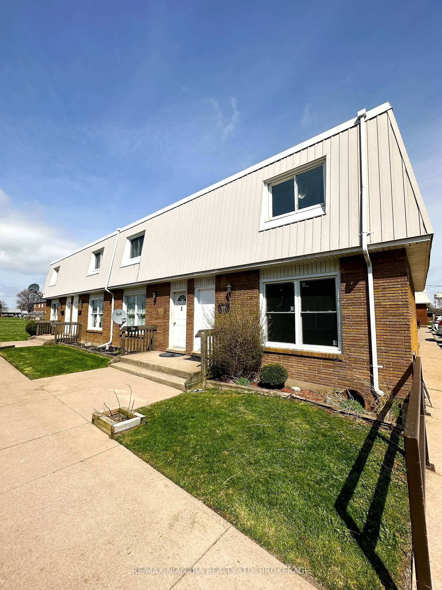 Beautifully renovated end unit townhome featuring 3 1 bedrooms, 2 bathrooms and fully finished basement !