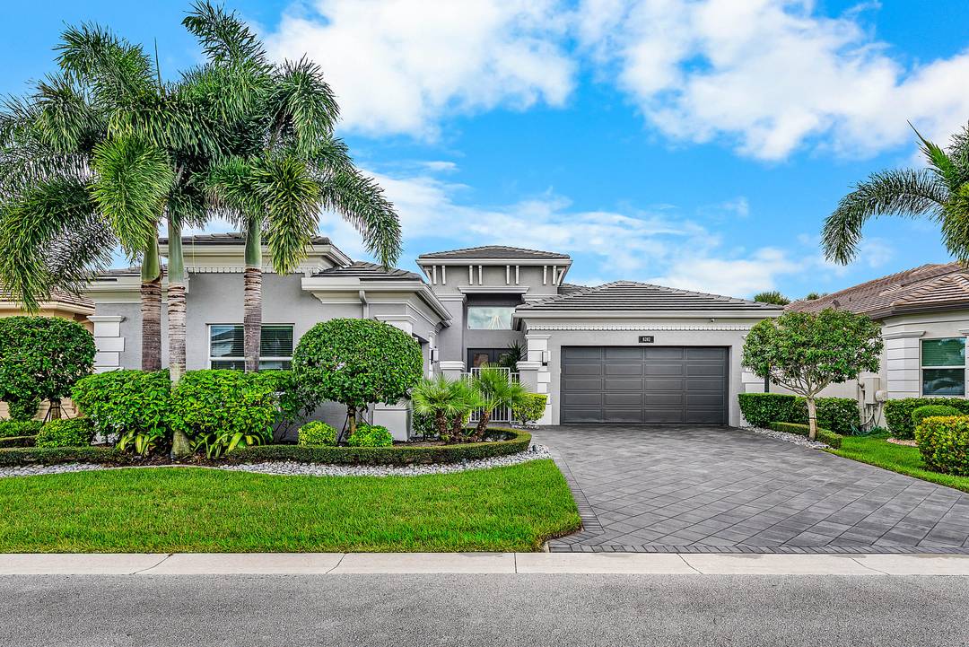 This beautifully appointed Caroline model sits on a lushly landscaped private lot backing south.