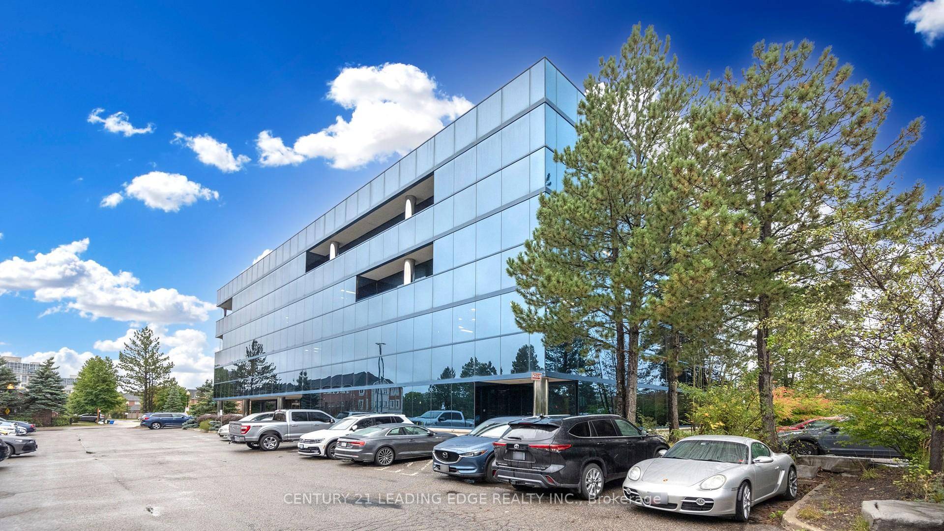 A Modern Glass 4 Story Office Building.