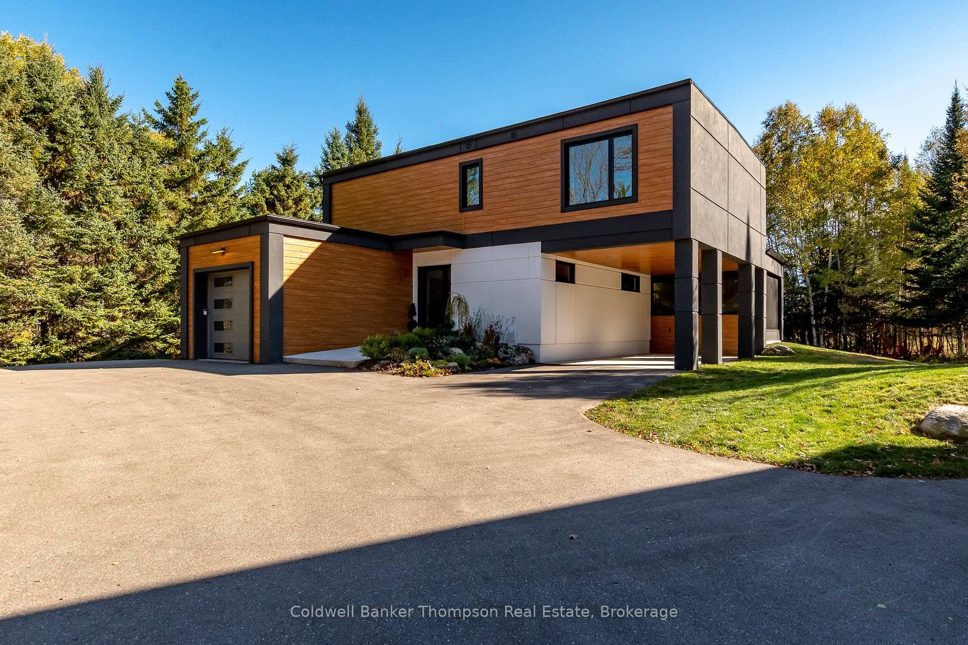 This stunning 2024 built modern residence sits on over 3 acres, offering the perfect balance of cleared space amp ; natural woodland.