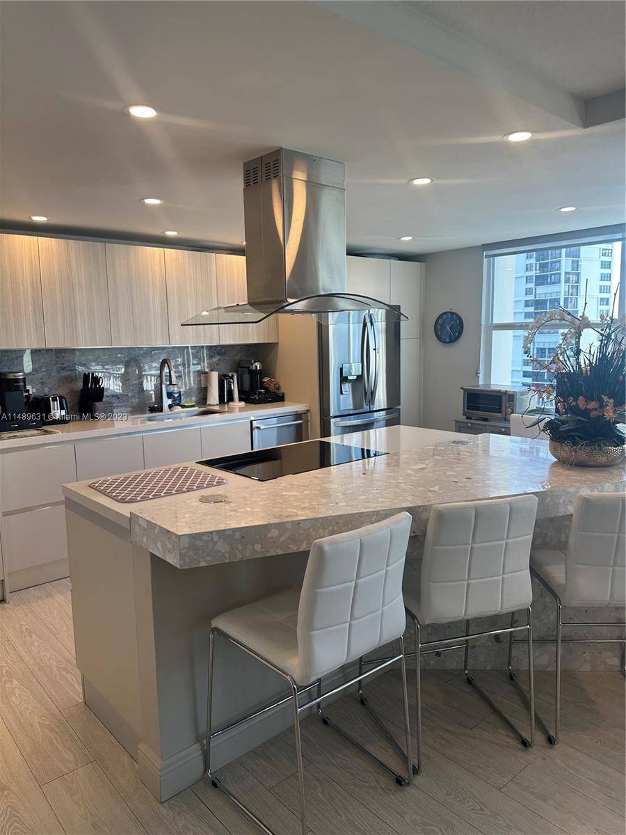 LOCATED DIRECTLY ON THE ICW BLOCKS FROM THE OCEAN, THIS TASTEFULLY UPDATED OPEN CONCEPT UNIT OFFERS BREATHTAKING WATER VIEWS FROM EVERY WINDOW.
