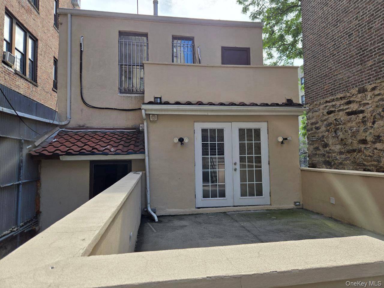 Full house rental by Fordham Road, across the street from the Main Library.