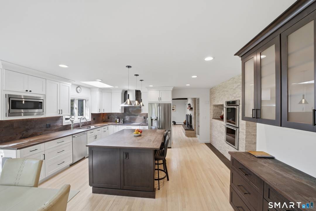Welcome to this stunning Westover ranch nestled on a quiet cul de sac, gracefully set on a sweeping driveway and filled with beautiful natural light throughout.
