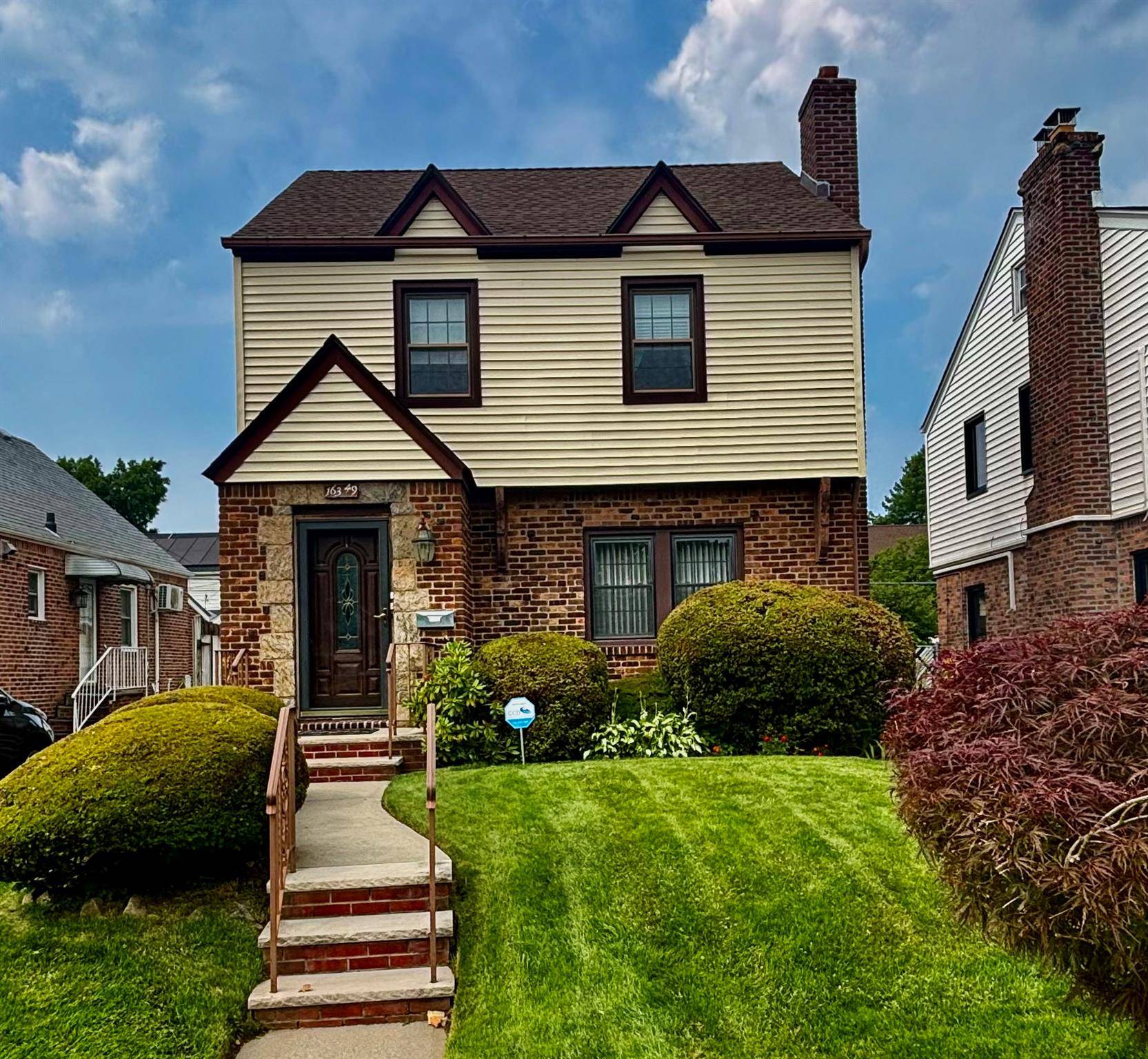 Beautifully maintained Tudor style home boasting classic architectural details and thoughtful updates for contemporary living.