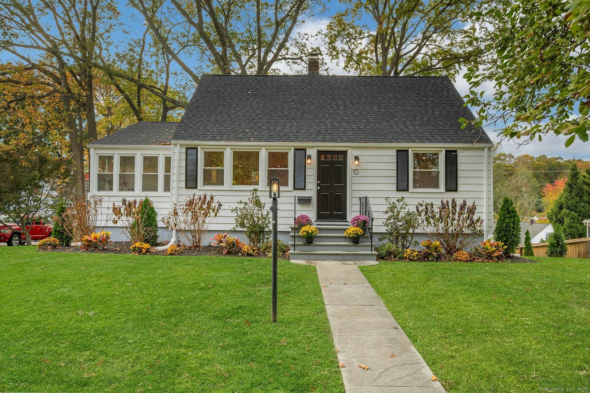 A perfect harmony of traditional style and fresh contemporary living in this sun filled and beautifully renovated classic Cape Cod.