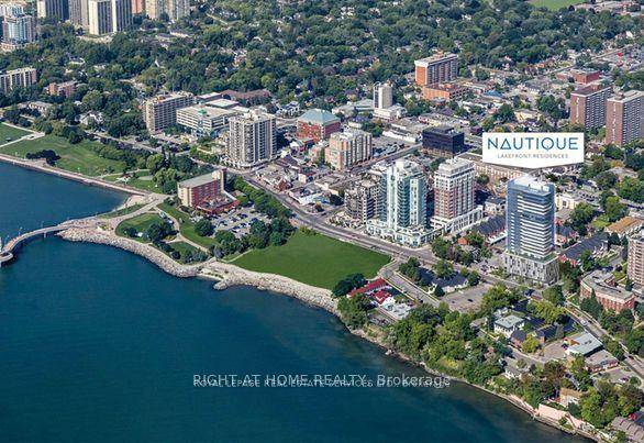 Luxurious 2 Bdrms, 2 full bath, Corner condo unit in The Nautique Lakefront Residence in downtown Burlington, Open Concept Kitchen with a built in Appliances, Cozy Living Room with an ...