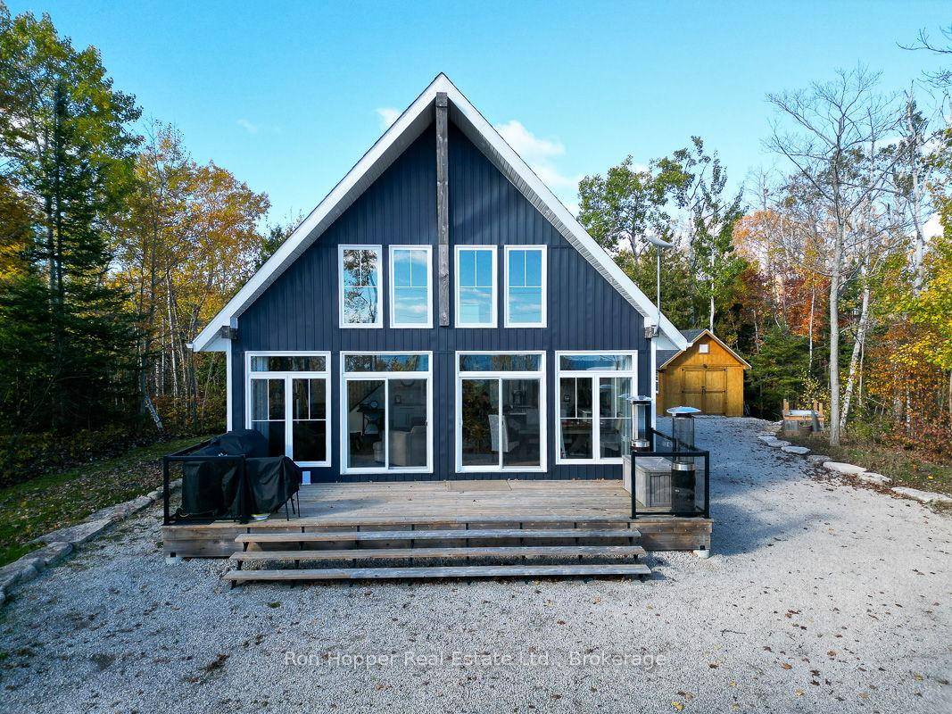Experience breathtaking elevated waterviews of Georgian Bay from this newly finished home cottage, perfectly designed for relaxed coastal living.