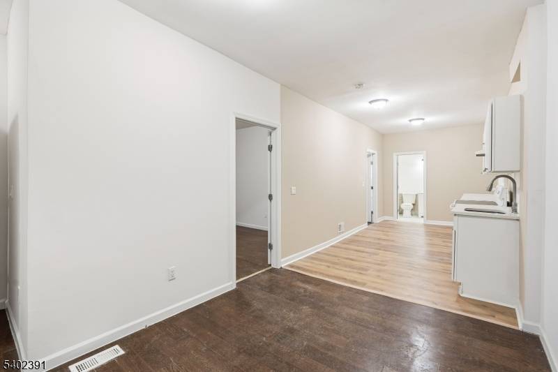 Renovated in 2021, this well maintained multi family property offers three separate living units, making it an ideal option for investors or owner occupants seeking flexibility and income potential.