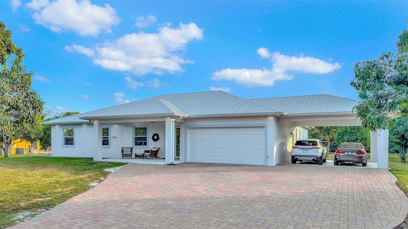 Nestled on 1. 3 acres, this CBS constructed 4 bedroom, 3 bathroom home with an office blends modern luxury, practicality, and natural charm.