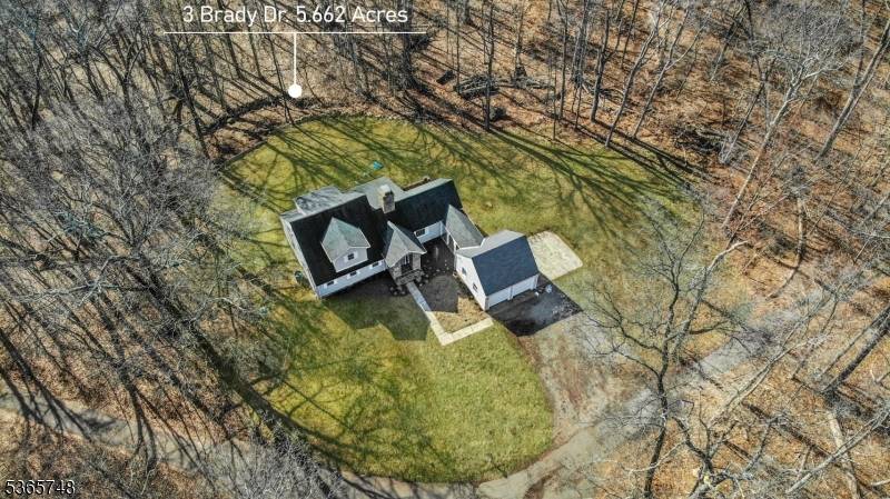 Welcome home to this picturesque Cape Cod farmhouse, nestled on the western edge of Hamilton Farms.