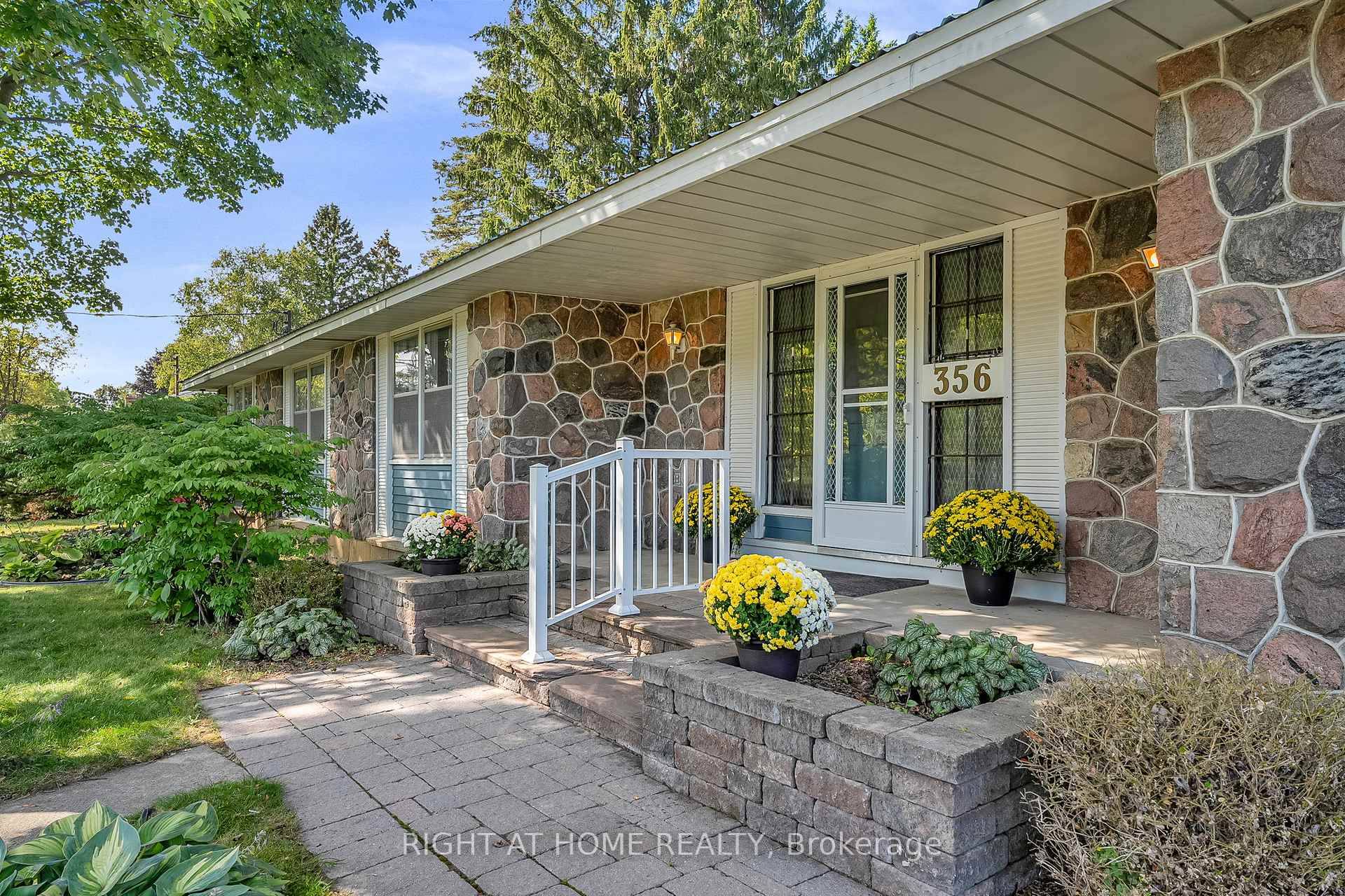 Unique Brick and Stone Granite Ranch Bungalow on country sized lot approx 100 ft x 166 ft per MPAC with covered Front Porch overlooking Oshawa's heritage Camp Samac's north forested ...